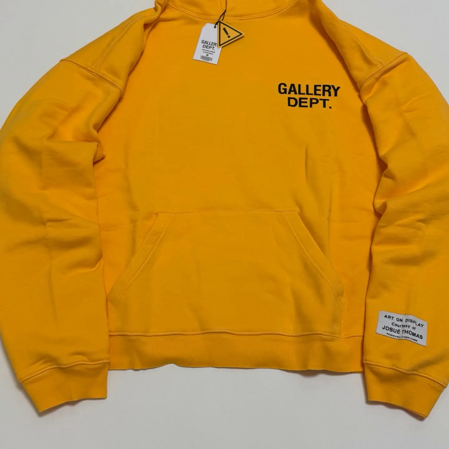 GALLERY DEPT. 90'S GD LOGO HOODIE 90's retro destruction yellow English hoodie Yellow S-XL Needs custom weaving and dyeing 500g high weight sweatshirt fabric Light fleece treatment on the inside Overall quite wide and comfortable Loose version Trendy and fashionable Same as the original version Water slurry non-touch printing process Original consistent hang tag with G LOGO hanging beads